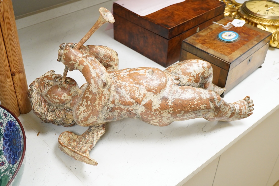A decorative simulated gesso wall putti, in Baroque style, approximately 55cm high